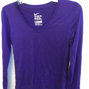 The Nike Tee S Dri-fit purple long sleeve v-neck